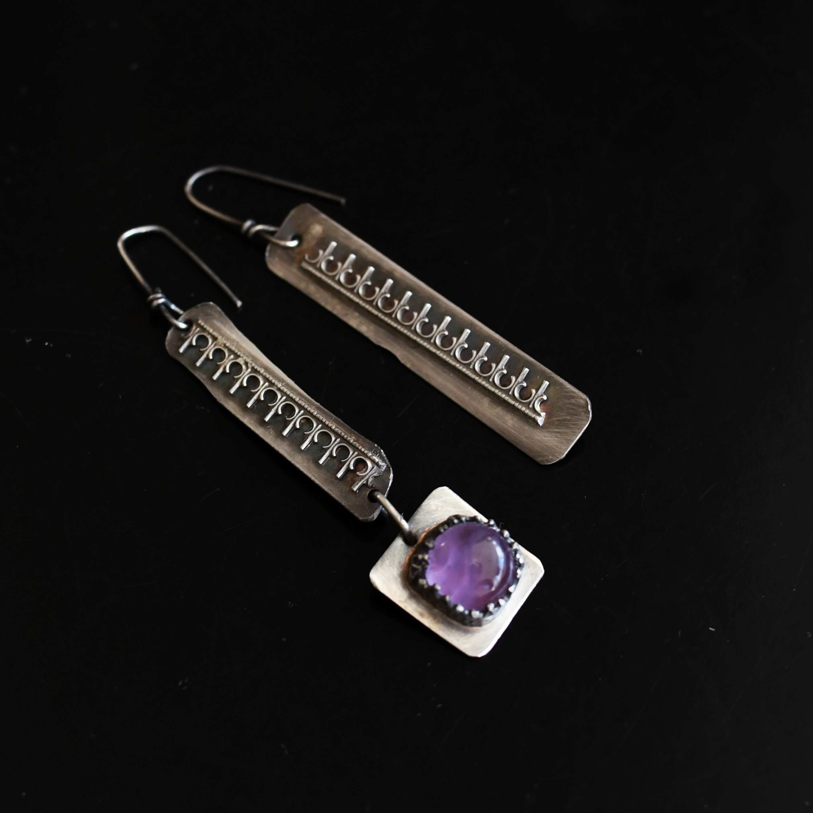 Odd pair of Amethyst silver earrings